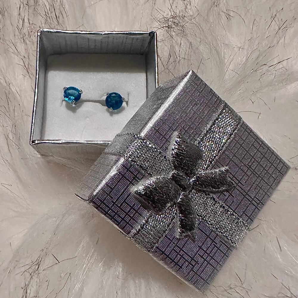 Aquamarine brand new in box screw back earrings.